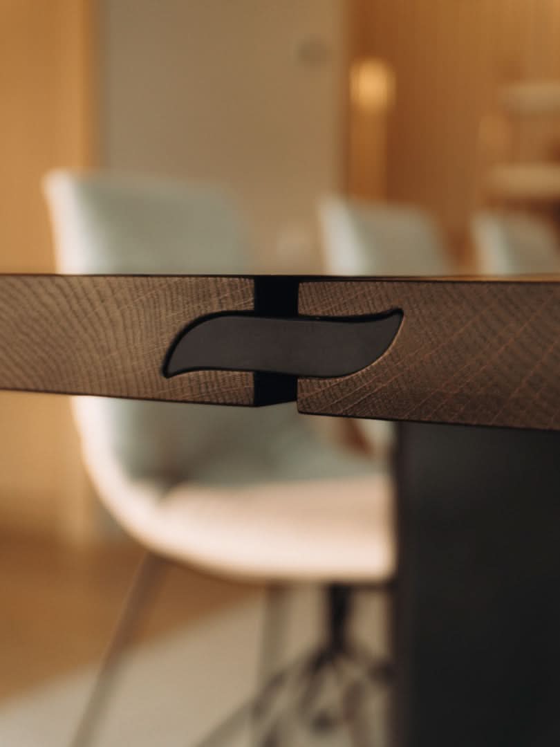 TEAM 7 echt.zeit table in smoked oak. photo: TEAM 7 - Available in Canada at The Mattress & Sleep Co.
