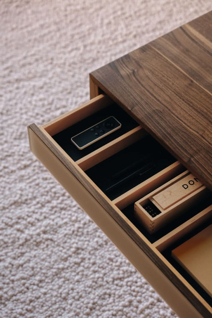 TEAM 7 lift coffee table in walnut. photo: TEAM 7 - Available in Canada at The Mattress & Sleep Co.