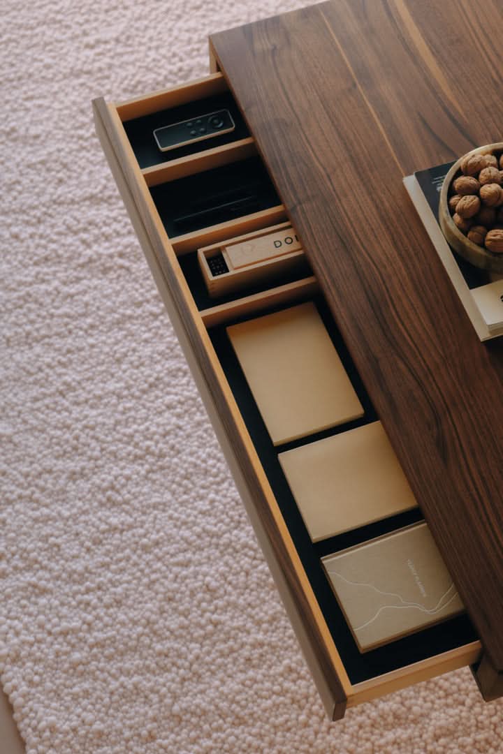 TEAM 7 lift coffee table in walnut. photo: TEAM 7 - Available in Canada at The Mattress & Sleep Co.