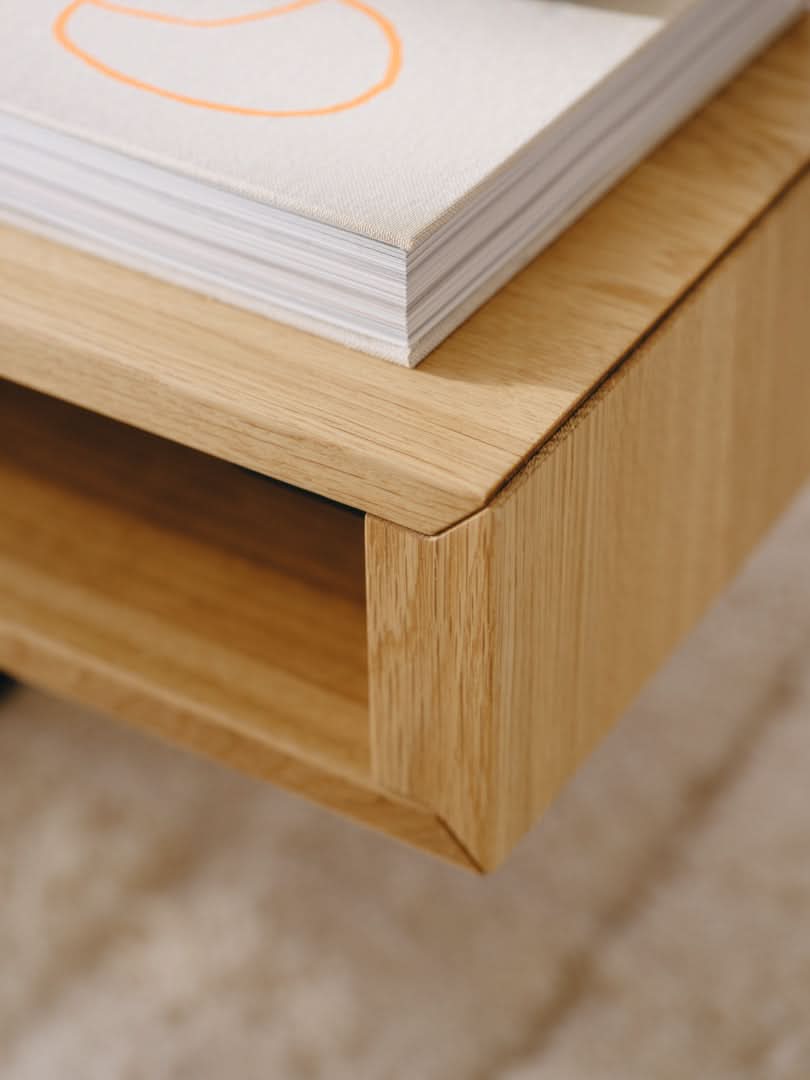 TEAM 7 lift coffee table in natural oak. photo: TEAM 7 - Available in Canada at The Mattress & Sleep Co.