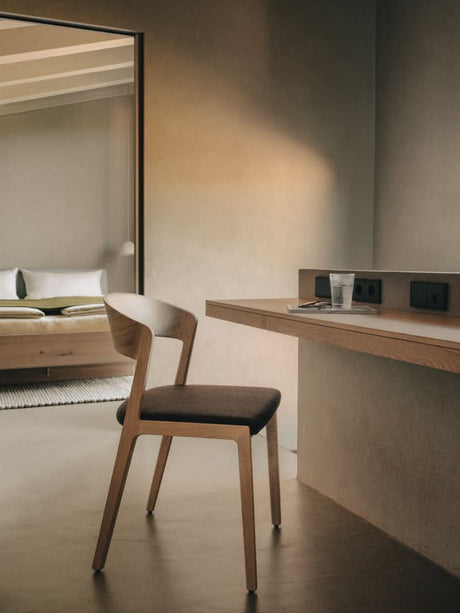 TEAM 7 nox bed + mylon chair in wild white oil oak. photo: TEAM 7 - Available in Canada at The Mattress & Sleep Co.