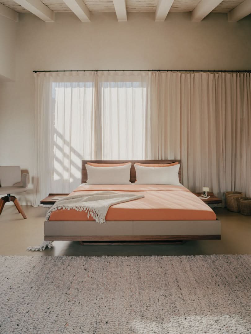 TEAM 7 riletto bed in walnut and light grey leather. photo: TEAM 7 - Available in Canada at The Mattress & Sleep Co.