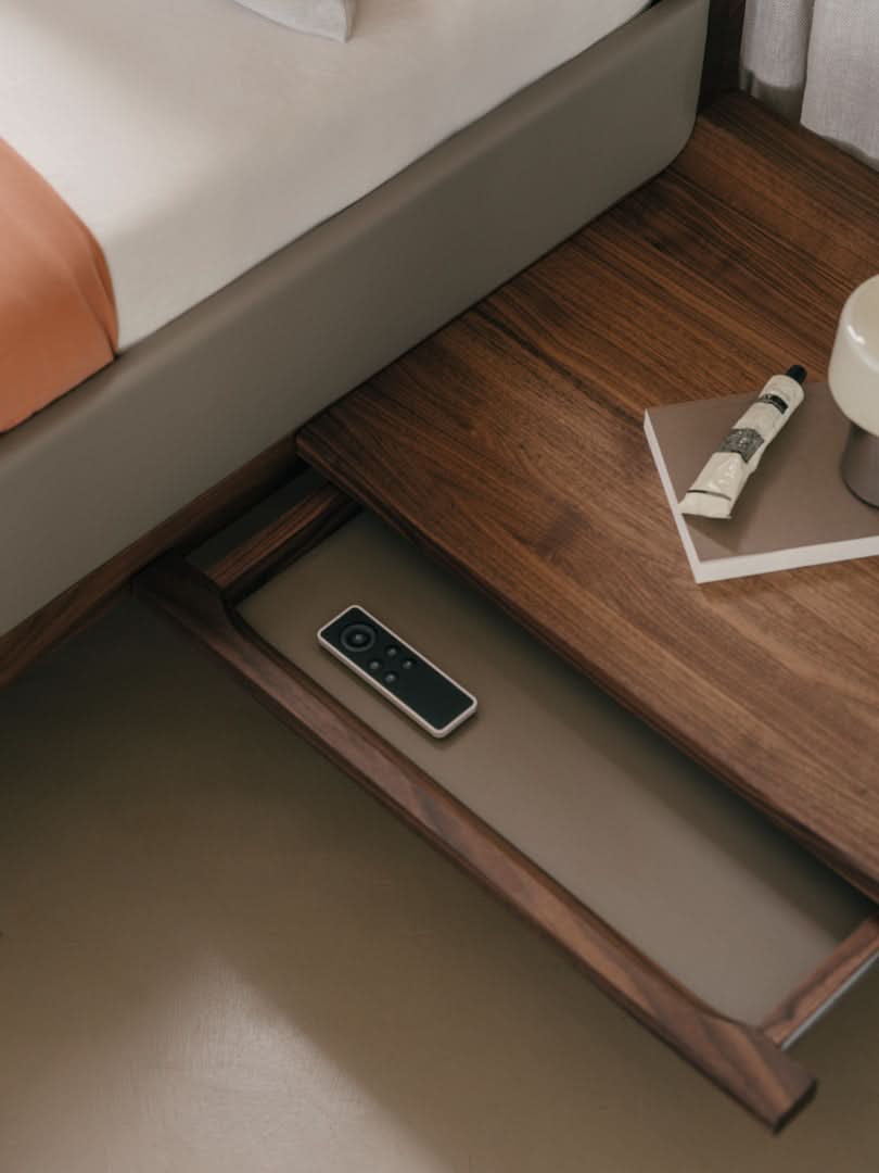 TEAM 7 riletto bed in walnut and light grey leather. photo: TEAM 7 - Available in Canada at The Mattress & Sleep Co.