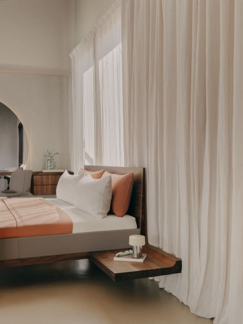 TEAM 7 riletto bed in walnut and light grey leather. photo: TEAM 7 - Available in Canada at The Mattress & Sleep Co.