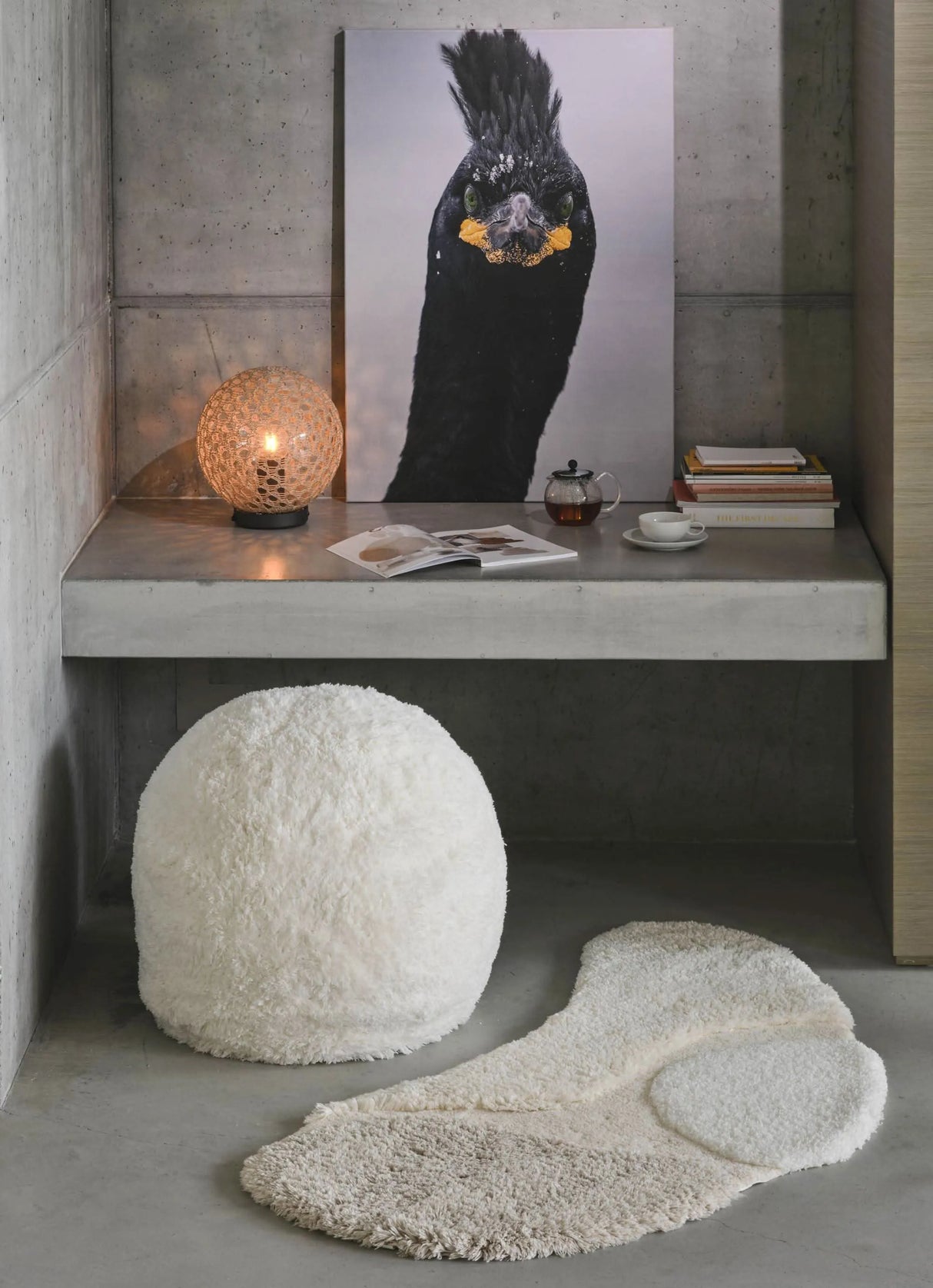 A&H Cordeira Bath Rugs feature white, ecru, ivory and linen tones and are available in two unique shapes and sizes