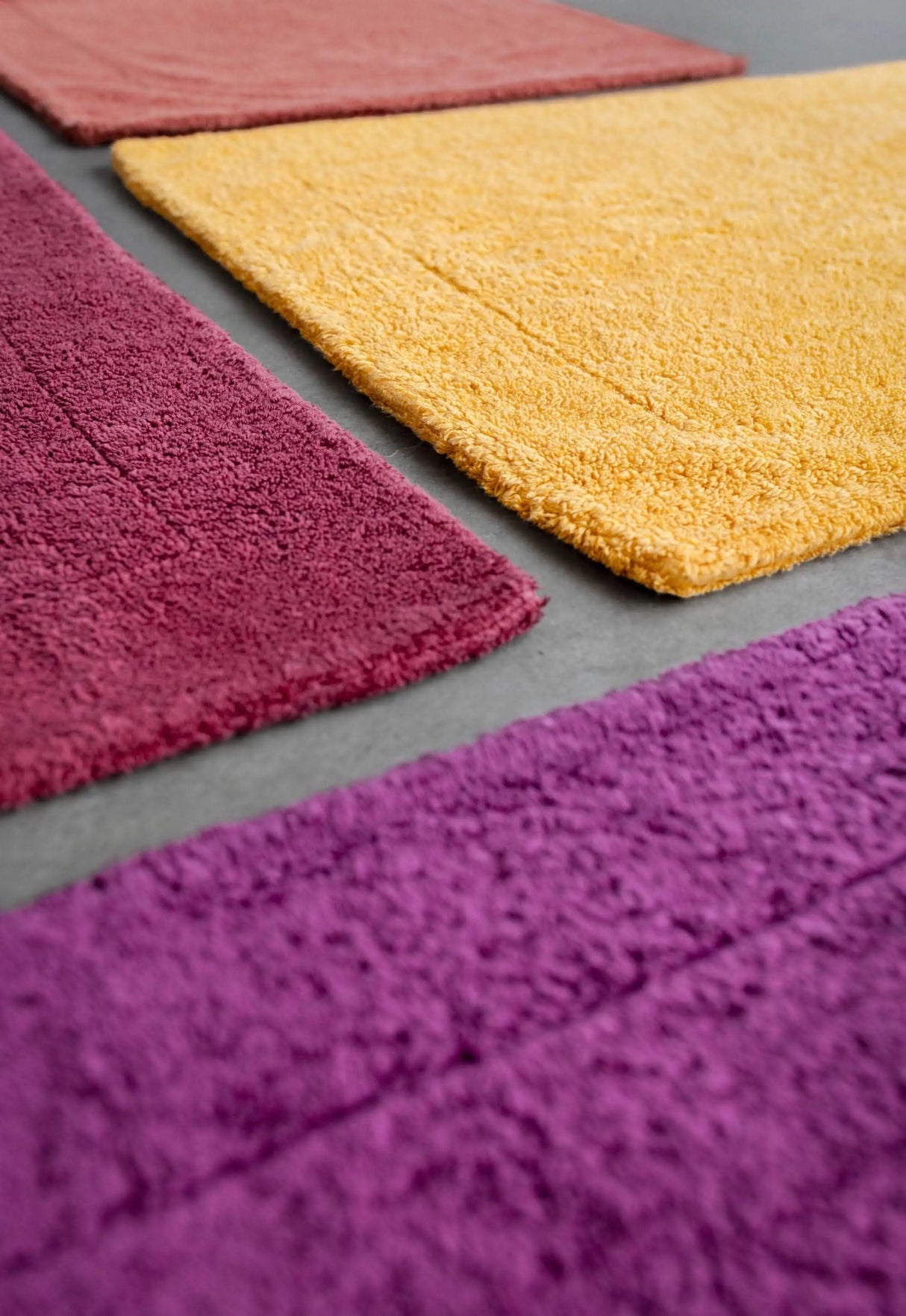 A&H Double Tub Mats, top: 515 Rosette Left: 578 Canyon, right: 830 Banane. Bottom: 514 Baton Rouge