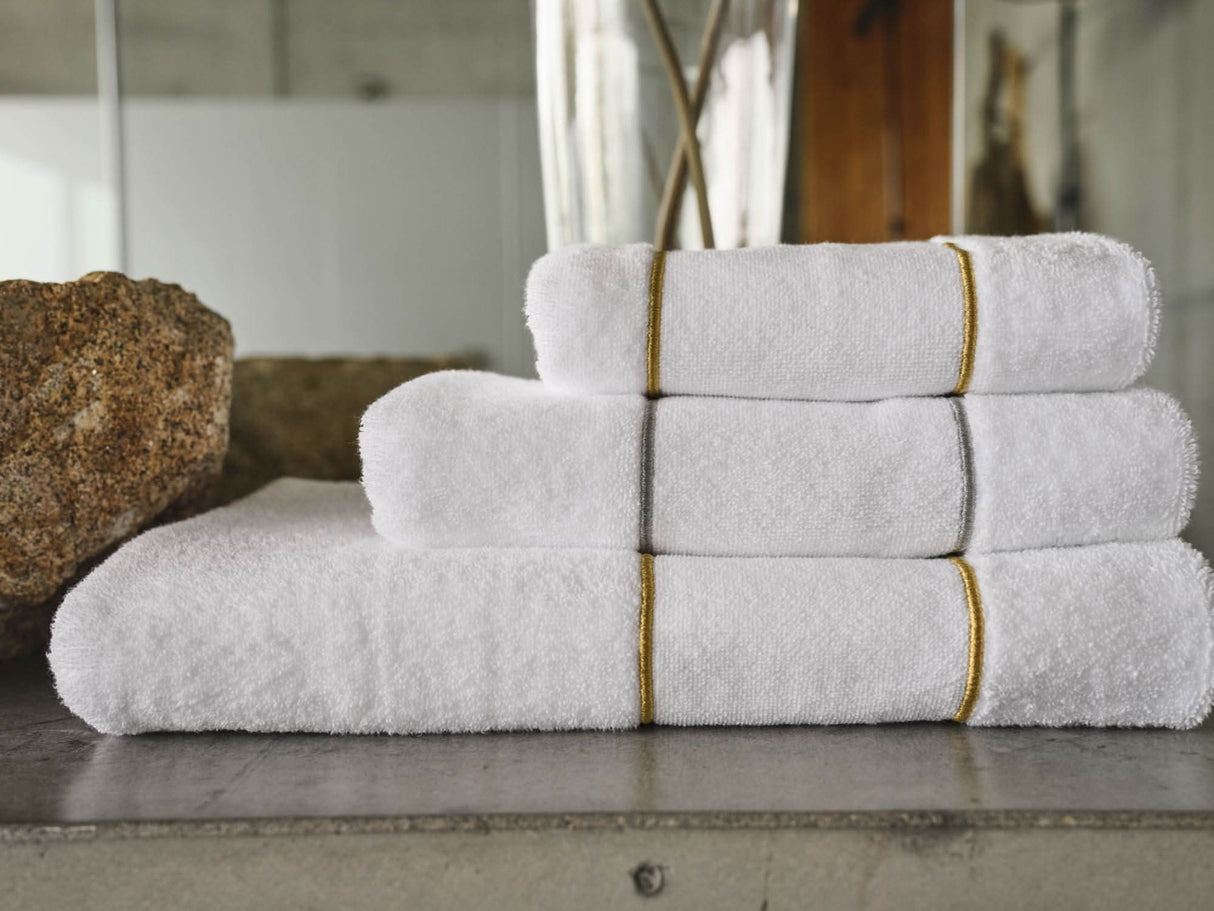 A&H Lara Embroidered Towels, top-to-bottom: 108 Gold Hand Towel, 109 Silver Hair Towel, 108 Gold Bath Towel