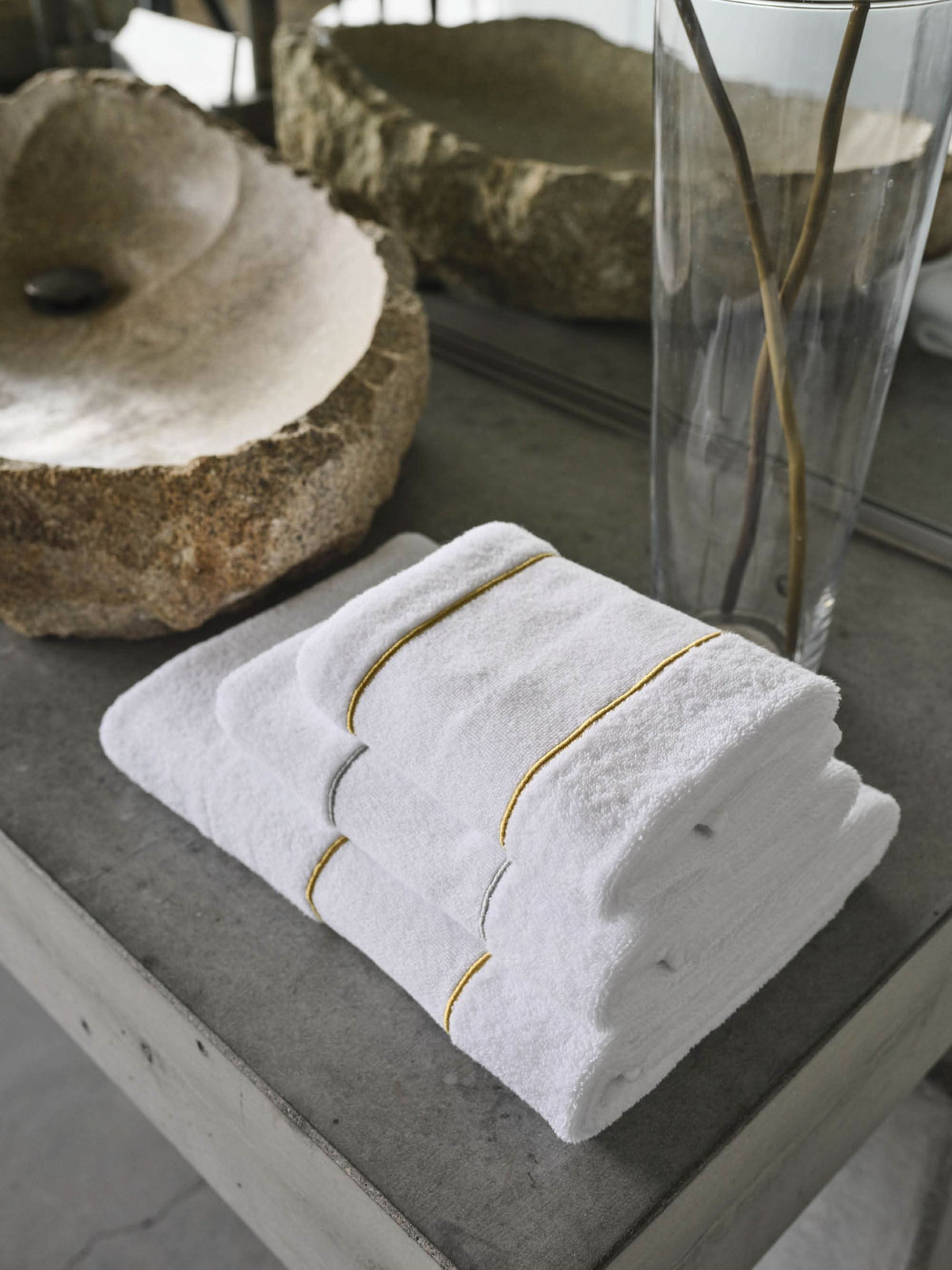 A&H Lara Embroidered Towels, top-to-bottom: 108 Gold Hand Towel, 109 Silver Hair Towel, 108 Gold Bath Towel
