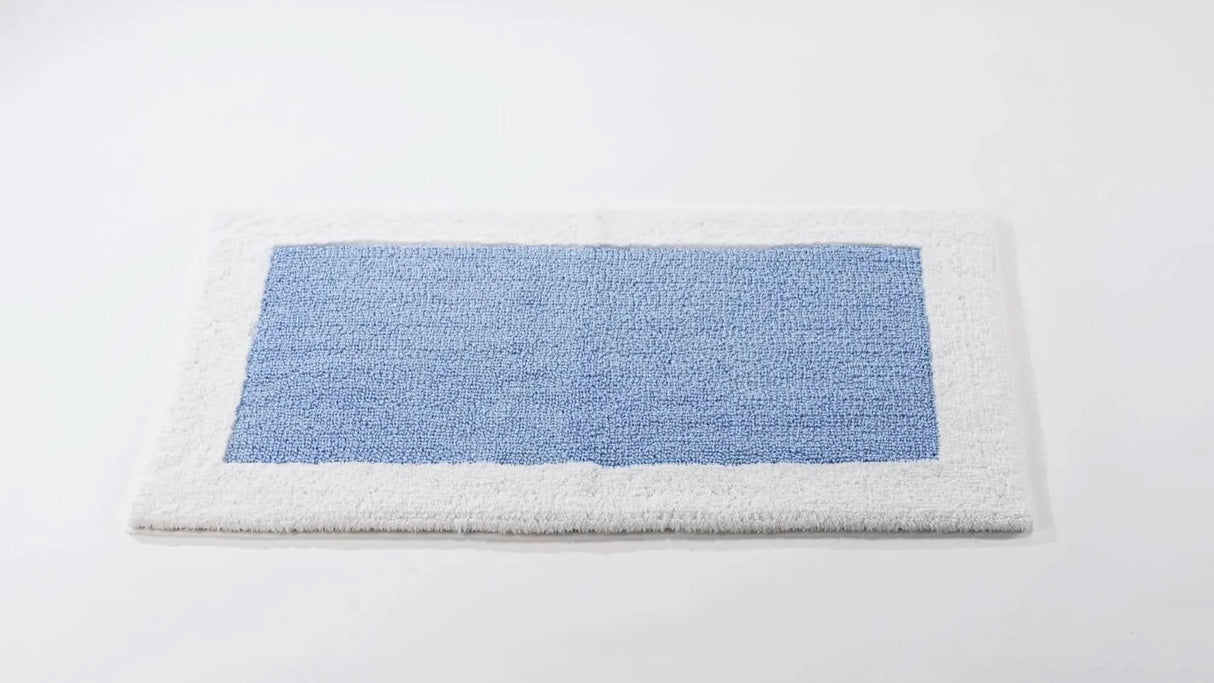 A&H Origine Reversible Bath Rug in 330 Powder Blue (Inset) and 100 White (Border). 100% Giza Egyptian Cotton Long Staple