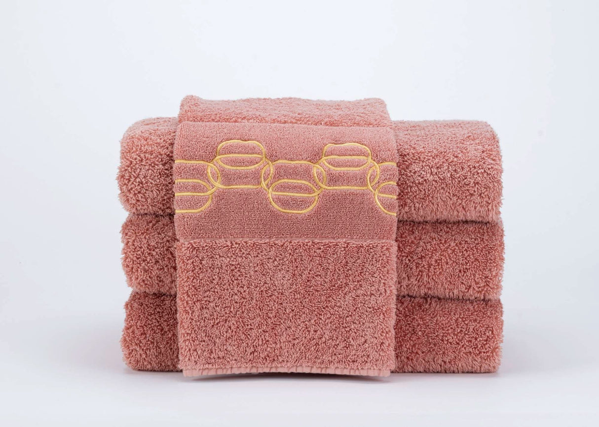 A&H Palacio Hand Towels feature gold embroidery. 515 Rosette base towel colour, in 100% Giza Egyptian Cotton Extra Long Staple