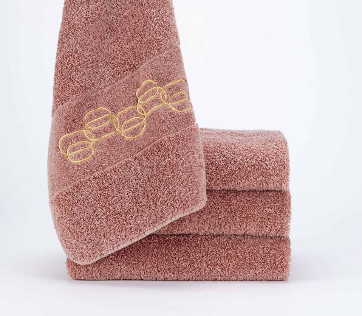 A&H Palacio Hand Towels feature gold embroidery. 515 Rosette base towel colour, in 100% Giza Egyptian Cotton Extra Long Staple