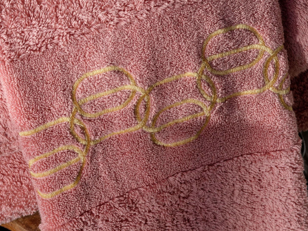 A&H Palacio Hand Towels feature gold embroidery. 515 Rosette base towel colour, in 100% Giza Egyptian Cotton Extra Long Staple