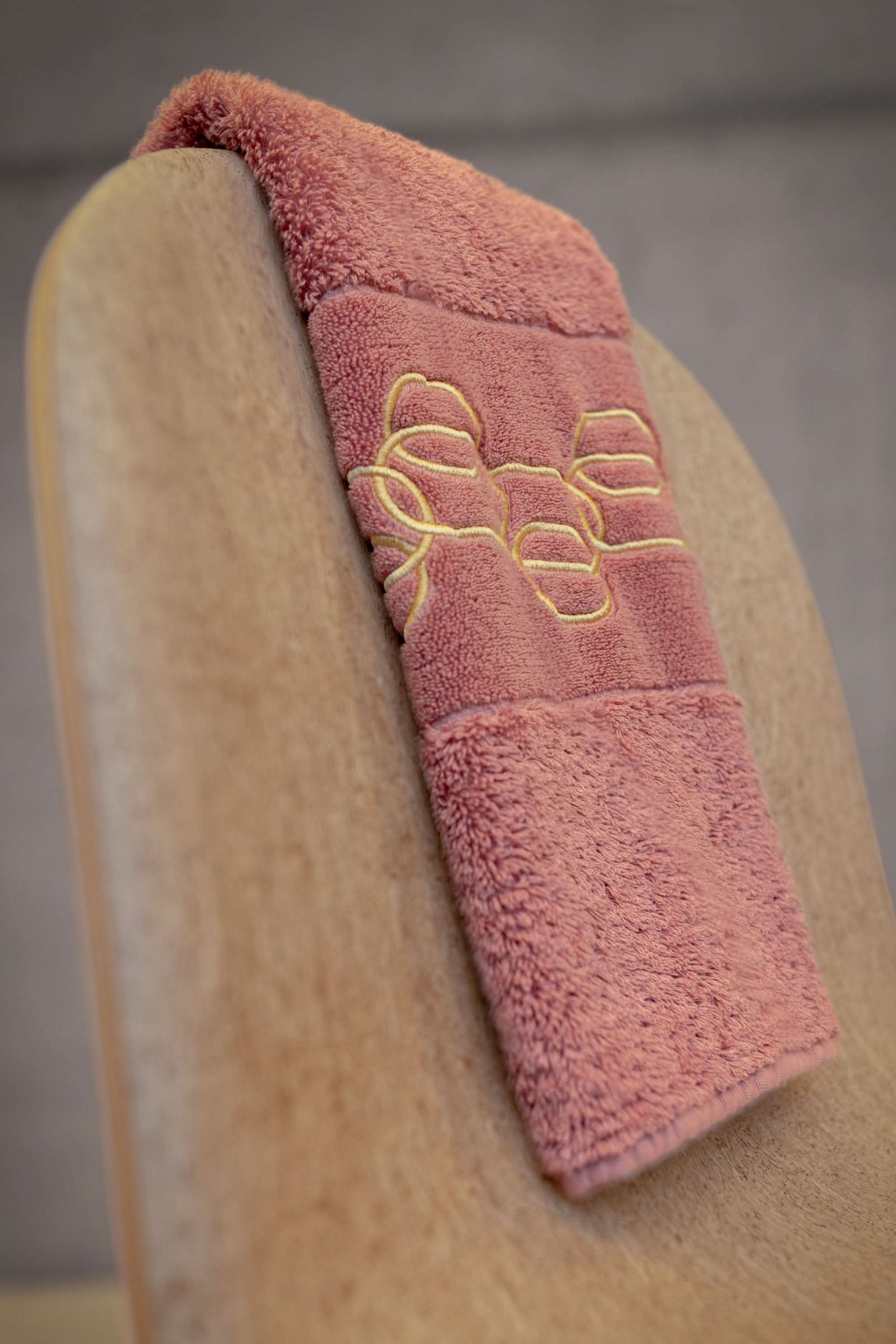 A&H Palacio Hand Towels feature gold embroidery. 515 Rosette base towel colour, in 100% Giza Egyptian Cotton Extra Long Staple