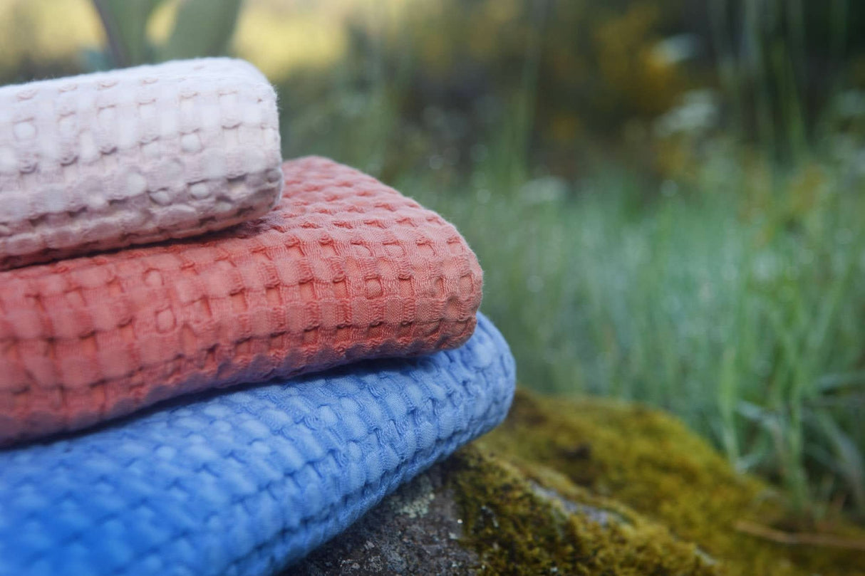 A&H Pousada Waffle Towels (top-to-bottom) in 610 Nude, 638 Chili and 364 Regatta