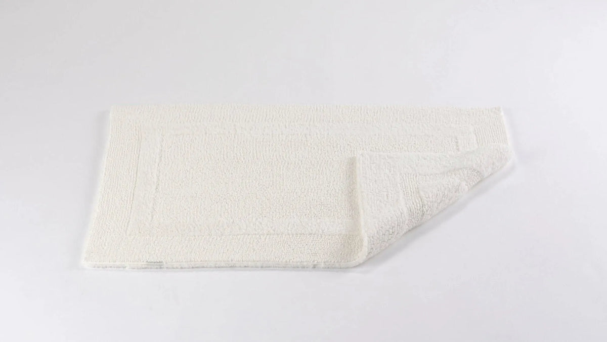 Abyss & Habidecor Reversible Rug in 103 Ivory. Available in Canada @ TMASC.