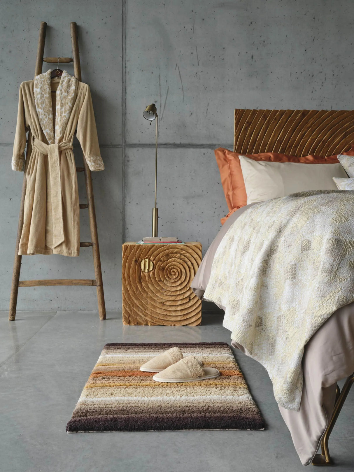 The A&H Santa Cruz Bath Rug in 737 Caramel. A&H Sauvage Robe in 714 Sand. A&H Comfy Slippers in 610 Nude