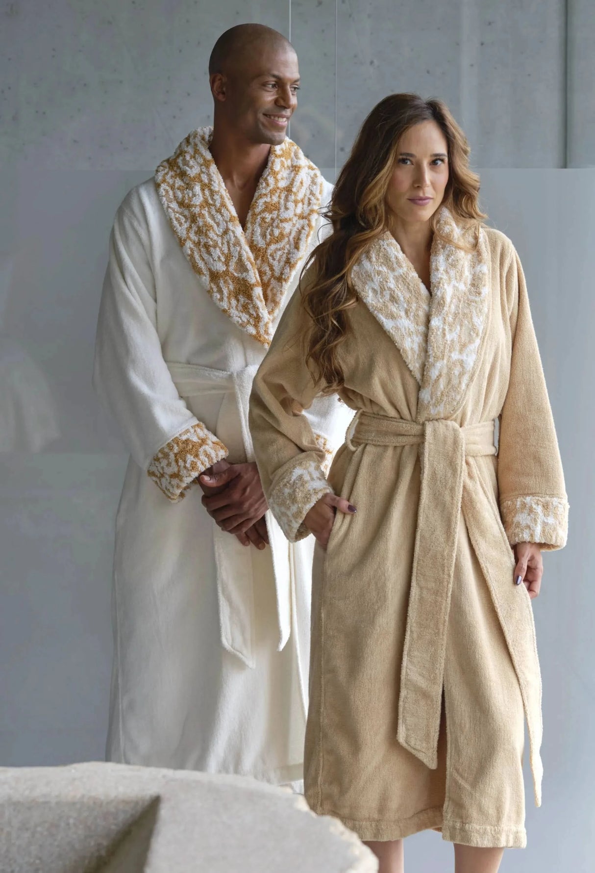 A&H Sauvage Robes. She's wearing colour 714 Sand, and he's wearing colour 840 Gold