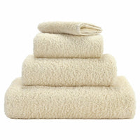 Abyss Super Pile Towels in 101 Ecru. Available in Canada @ TMASC.