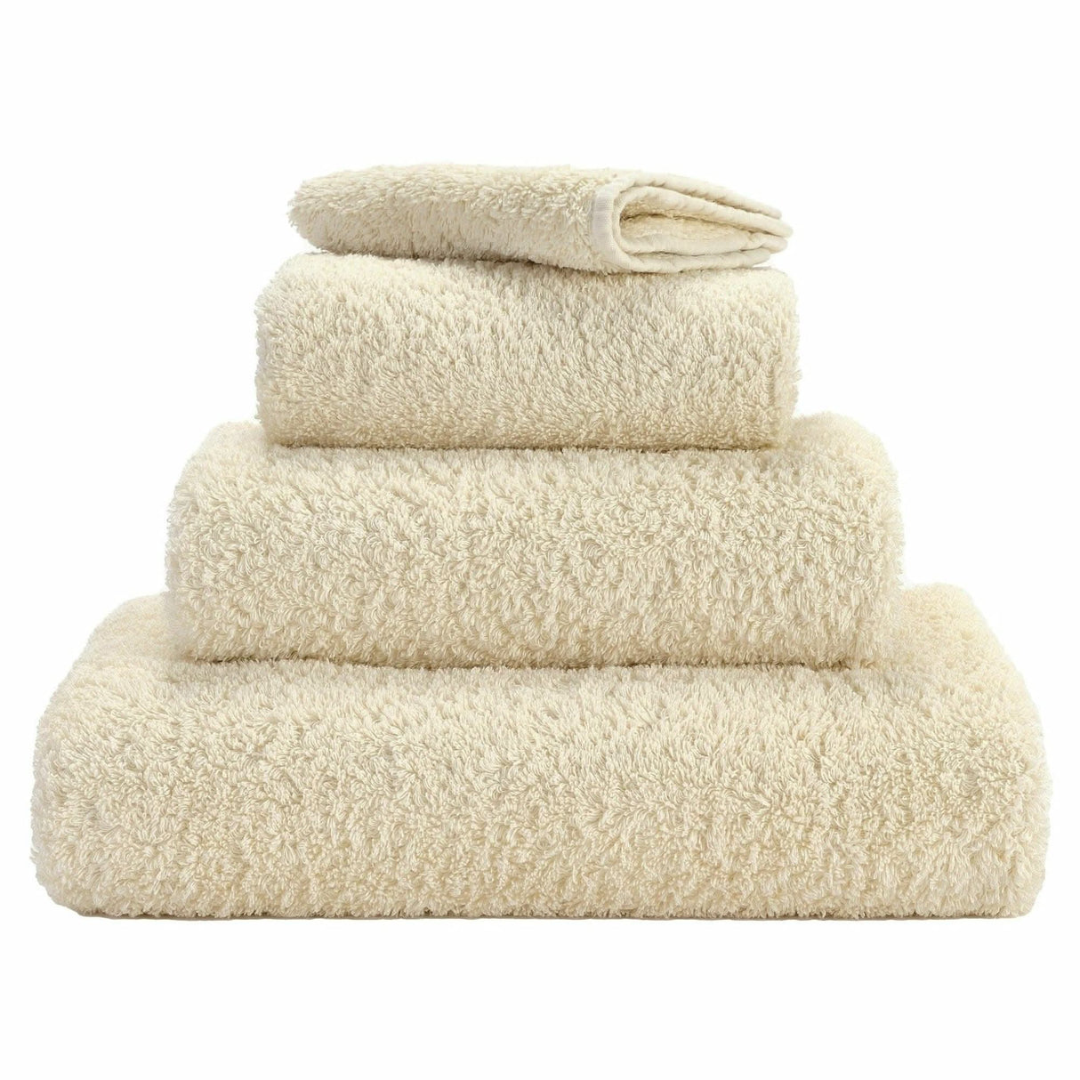 Abyss Super Pile Towels in 101 Ecru. Available in Canada @ TMASC.