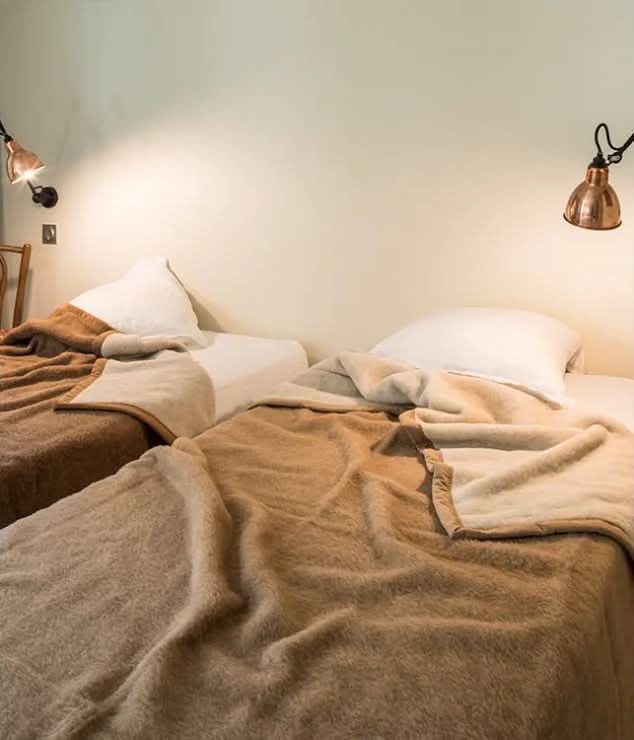 Chamois / Crème (left), Café / Crème (right). 100% Alpaca Blankets by Brun de Vian-Tiran