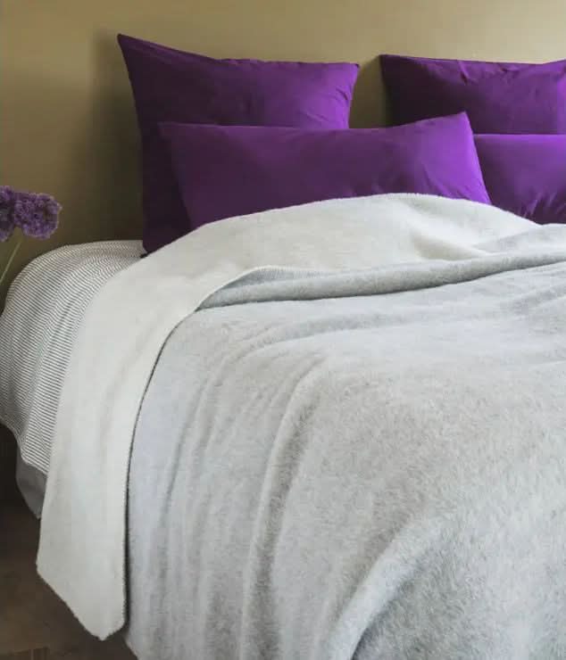 Gris Clair / Crème. Shown with optional festoon edges. 100% Alpaca Blankets by Brun de Vian-Tiran