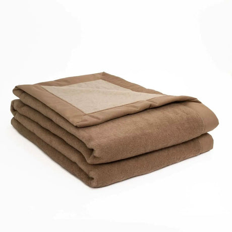 Ispahan is a double-faced 100% pure Camel hair - Blond (light) and Natural (dark) reversible winter-weight blanket