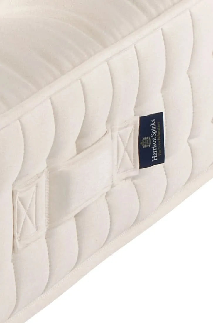 Airton positioning handle close-up. Seat-belt stitching ensures these handles are structurally functional and not decorative.