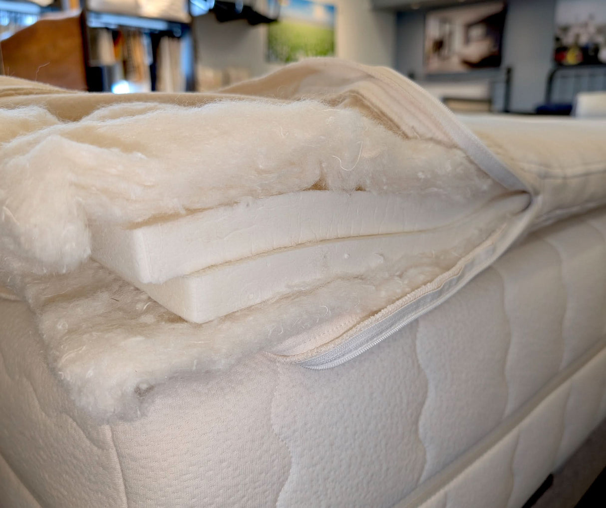 The wool layers in our organic mattress topper are needle punched and quilted to the organic cotton knit cover