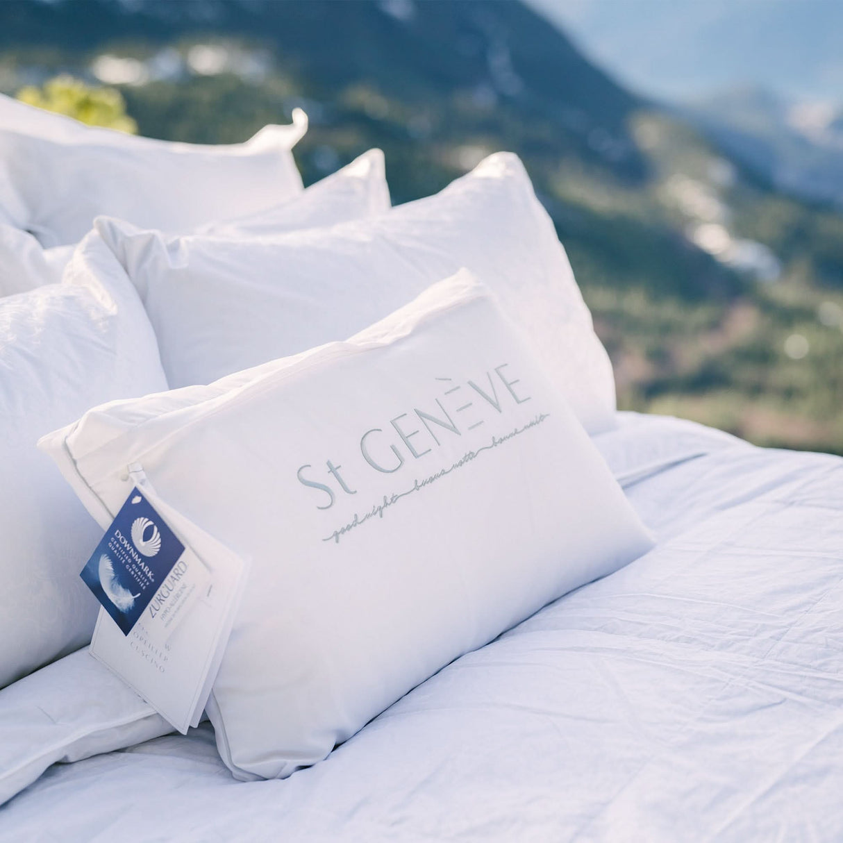 St Genève down pillows include key certifications for their hypoallergenic construction and authenticity