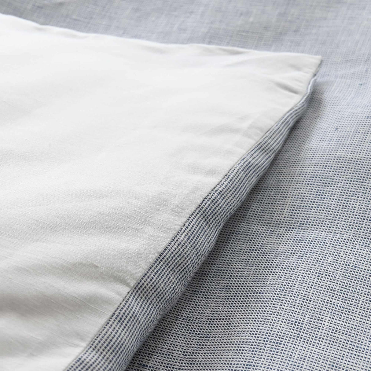Colette Check in French Blue - knife edge detail. Reverse of duvet cover is Veritae