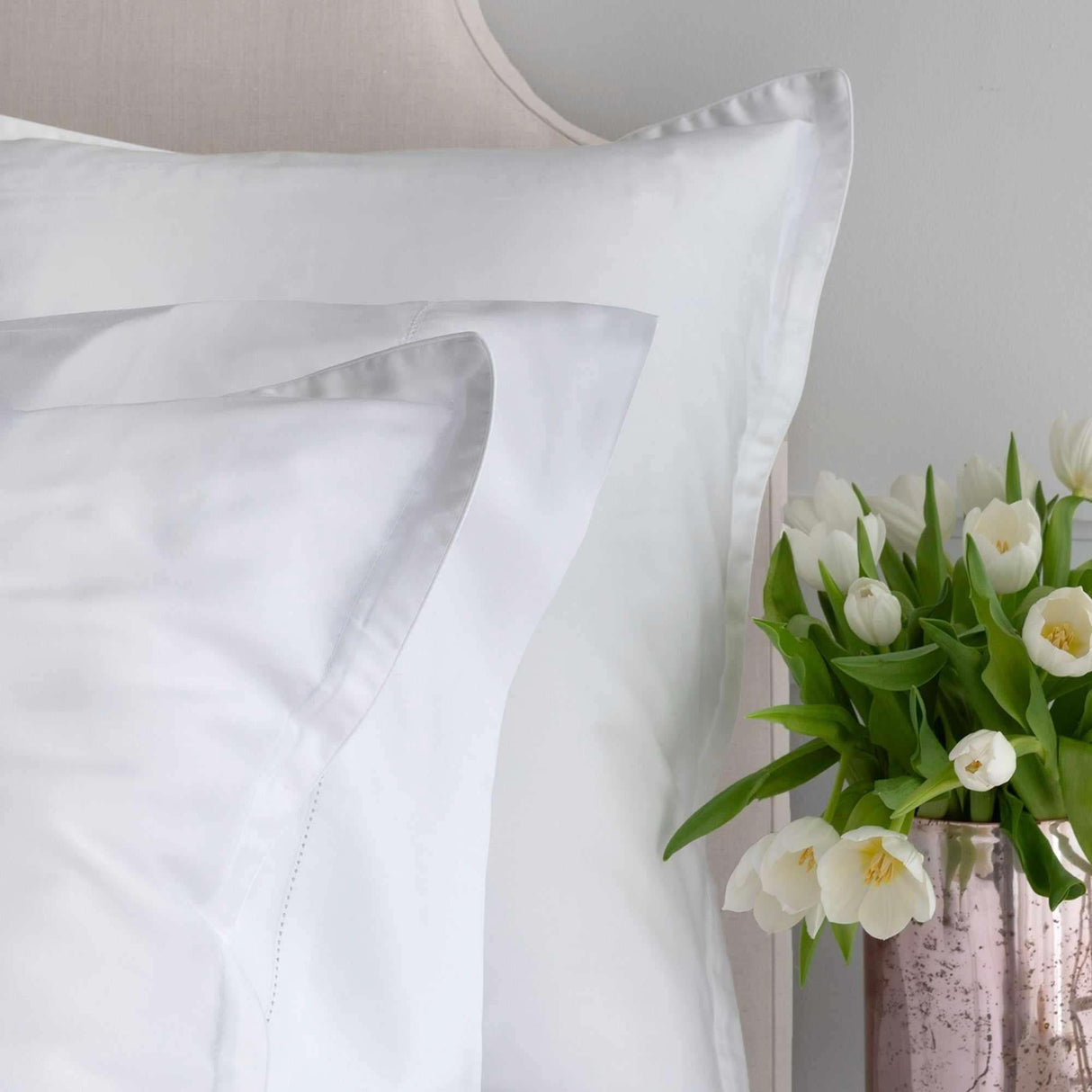 Cora is a gorgeous 100% MicroModal sateen in solid white. Shams feature a 1" flange and self-piping