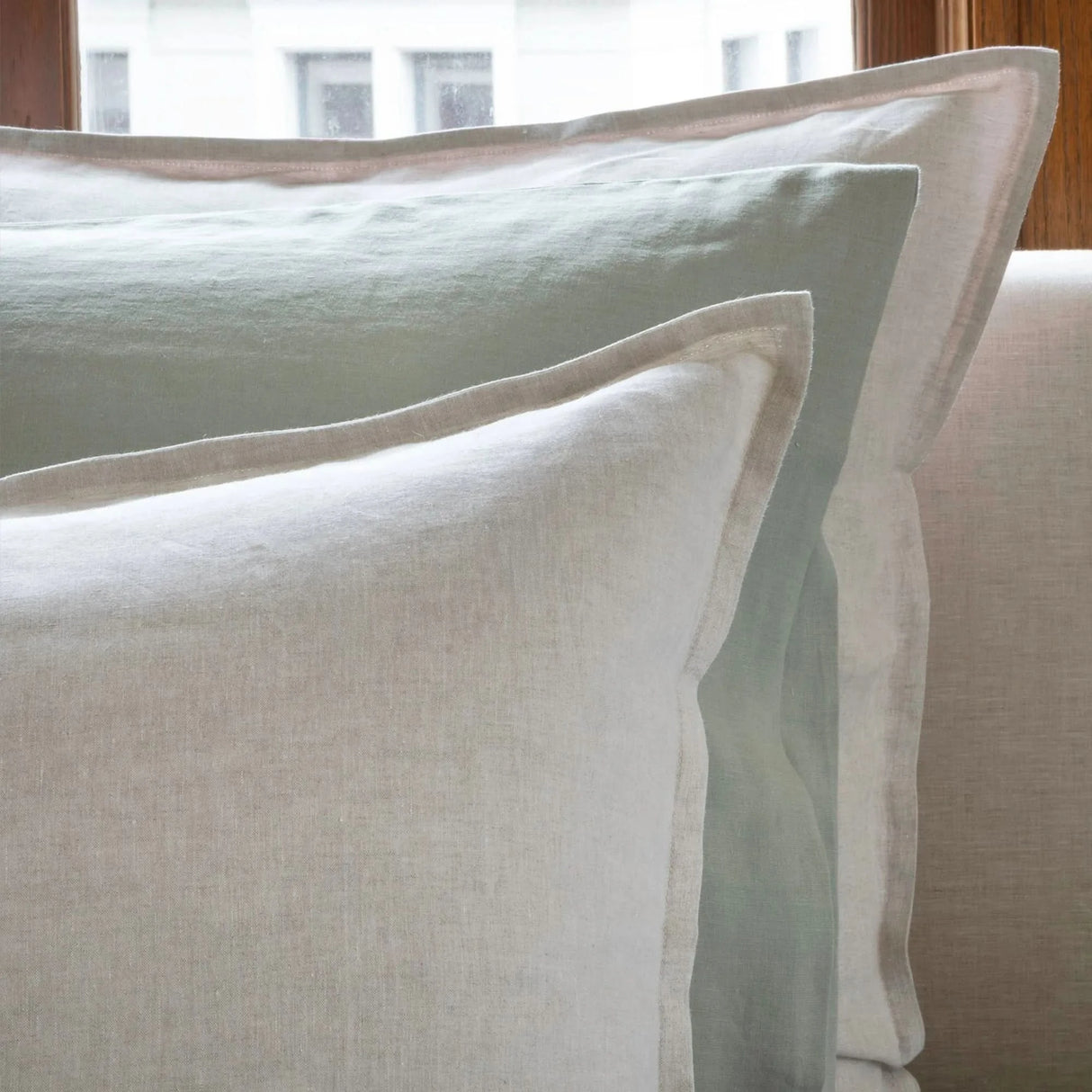 St Genève Echo Linen in Eucalyptus (middle knife-edge pillow)