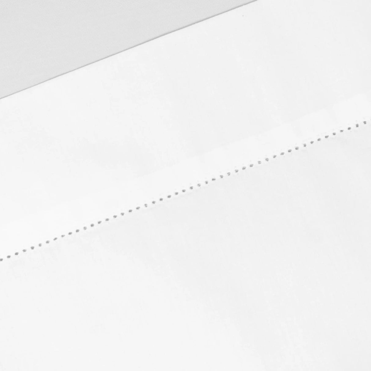 St Genève Venice sheeting in white, with a close-up of the hemstitch detail