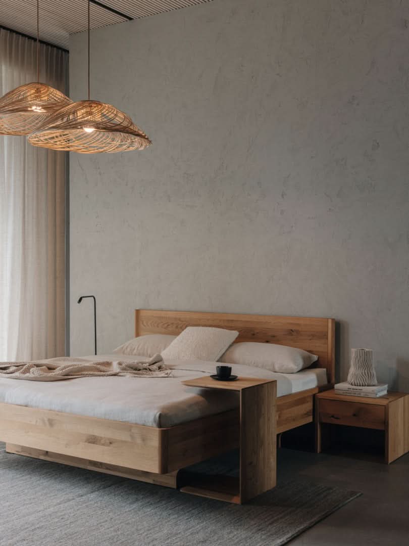 TEAM 7 times bed in wild natural oil oak, w/ clip table and lunetto nightstand. photo: TEAM 7