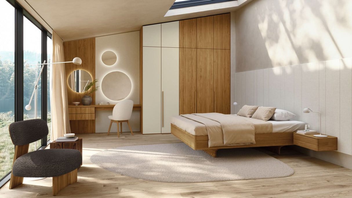 TEAM 7 times bed base in natural oil oak, w/ float nightstand, elliot lounge chair, flor chair and soft wardrobe system. photo: TEAM 7