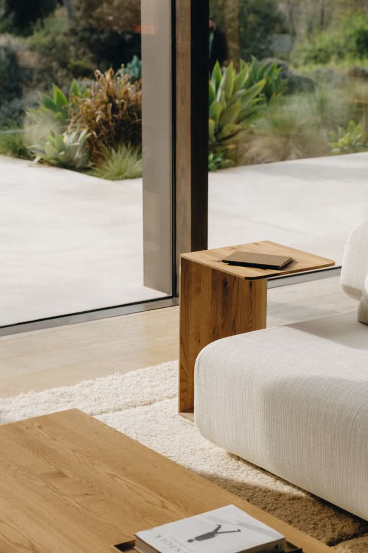 TEAM 7 clip side table in wild natural oak. photo: TEAM 7 - Available in Canada at The Mattress & Sleep Co.