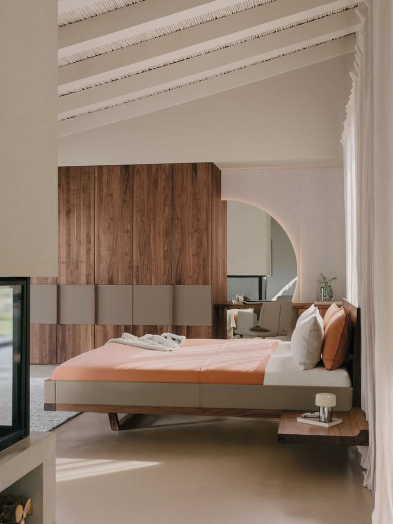 TEAM 7 riletto bed in walnut and light grey leather. photo: TEAM 7 - Available in Canada at The Mattress & Sleep Co.