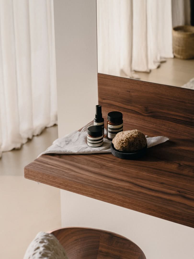 TEAM 7 riletto occasional furniture in walnut and light grey leather. photo: TEAM 7 - Available in Canada at The Mattress & Sleep Co.