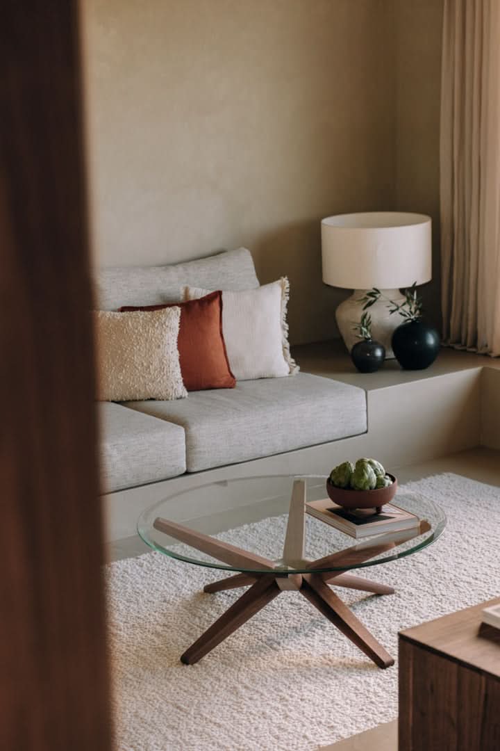 TEAM 7 stern coffee table in walnut w/ clear glass. photo: TEAM 7 - Available in Canada at The Mattress & Sleep Co.