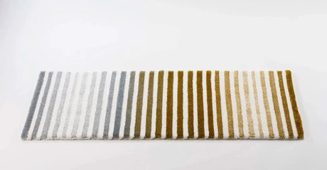 The A&H Barns Bath Rug is a striped runner/dual vanity rug. Colours include 100 White, 103 Ivory, 840 Gold, 930 Perle and 992 Platinum