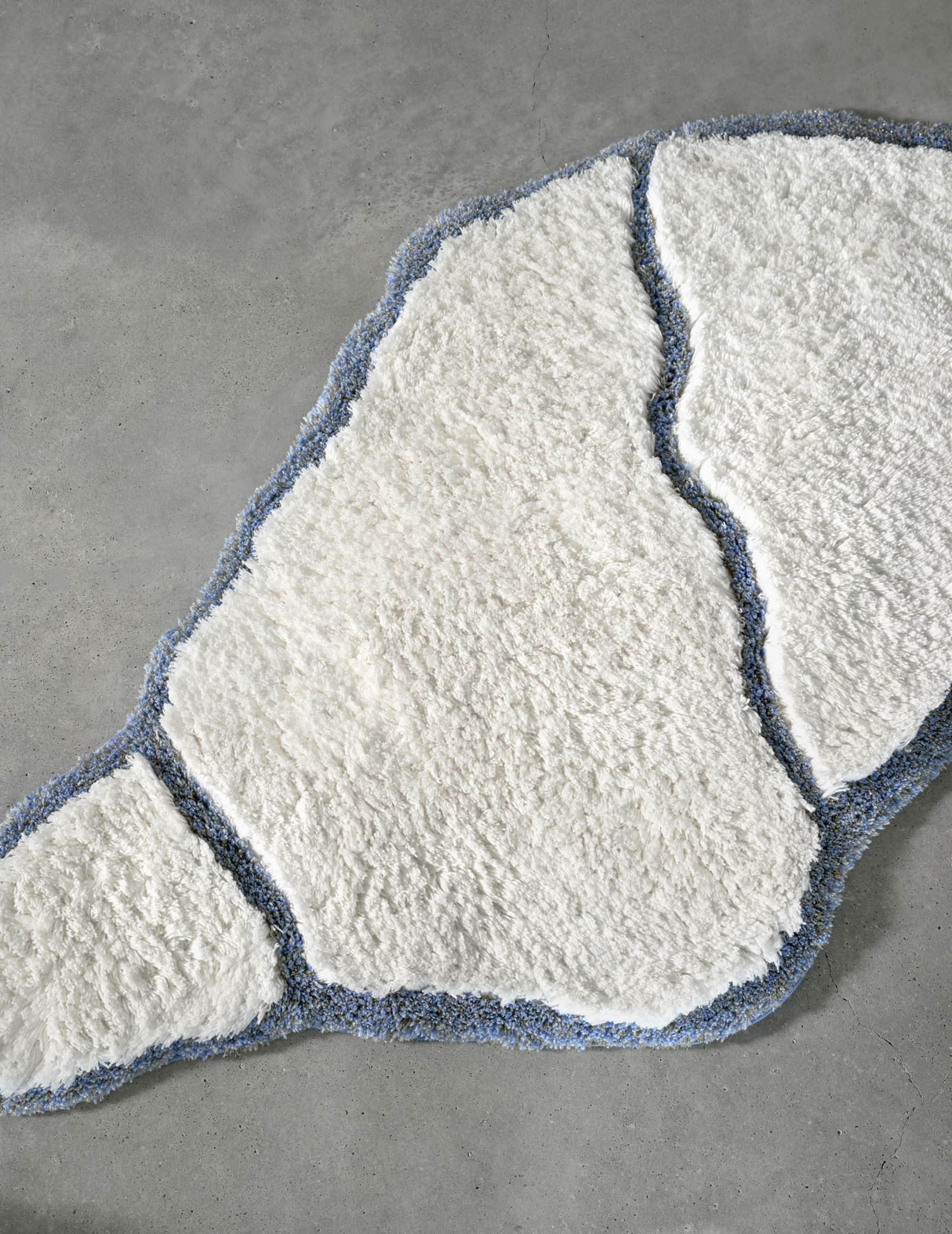 A&H Jess Bath Rug in 330 Powder Blue. 100 White plush pile + lurex (shimmer) powder blue trim