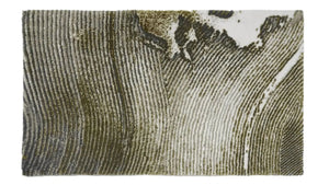 The A&H Lana Bath Rug features a striking striped design in gold, ivory and grey tones