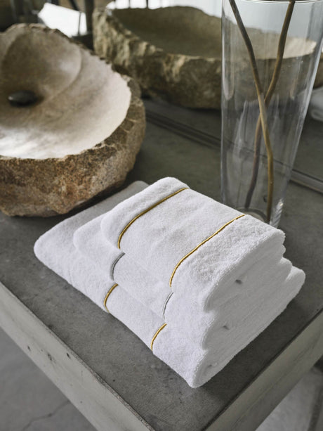 A&H Lara Embroidered Towels, top-to-bottom: 108 Gold Hand Towel, 109 Silver Hair Towel, 108 Gold Bath Towel