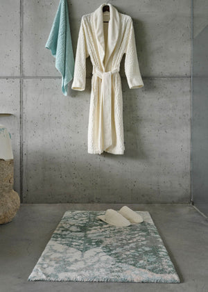 A&H Monoke Bath Rug. A&H Lodge Towel (235 Ice), Robe and Slippers (103 Ivory)