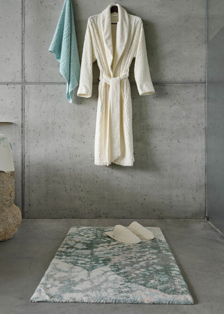 A&H Monoke Bath Rug. A&H Lodge Towel (235 Ice), Robe and Slippers (103 Ivory)