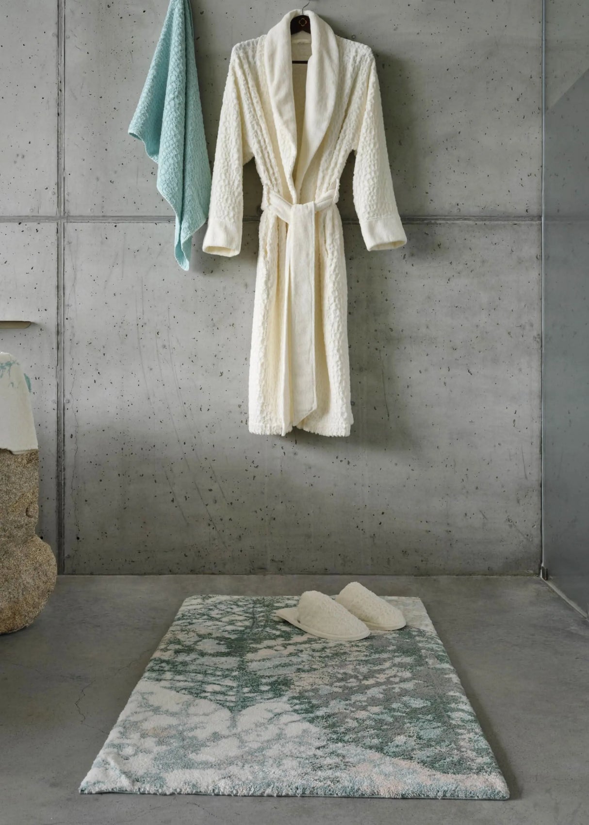 A&H Monoke Bath Rug. A&H Lodge Towel (235 Ice), Robe and Slippers (103 Ivory)