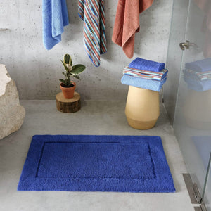 A&H Must Bath Rug in 304 Marina (23 x 39"). 