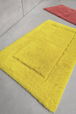 A&H Must Rugs in 278 Yuzu (foreground) and 638 Chili (background)