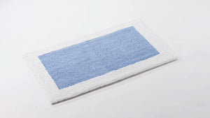 A&H Origine Reversible Bath Rug in 330 Powder Blue (Inset) and 100 White (Border). 100% Giza Egyptian Cotton Long Staple