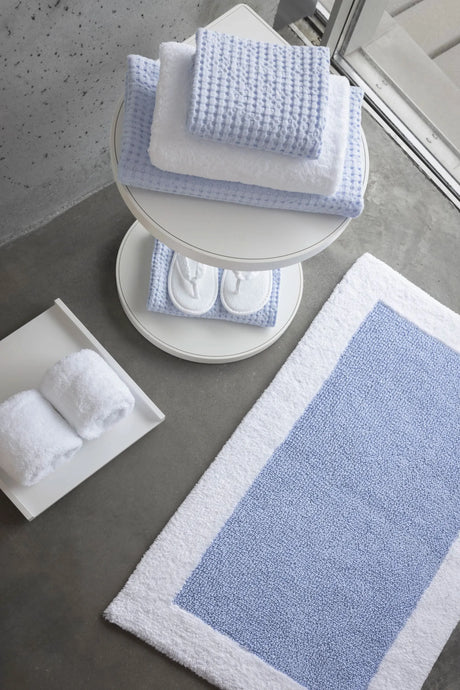 A&H Origine Reversible Bath Rug in 330 Powder Blue (Inset) and 100 White (Border). 100% Giza Egyptian Cotton Long Staple